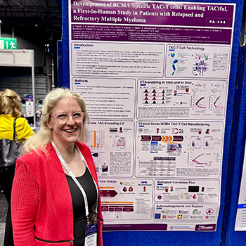 Dr. Annette Hay with the TACtful Trial poster